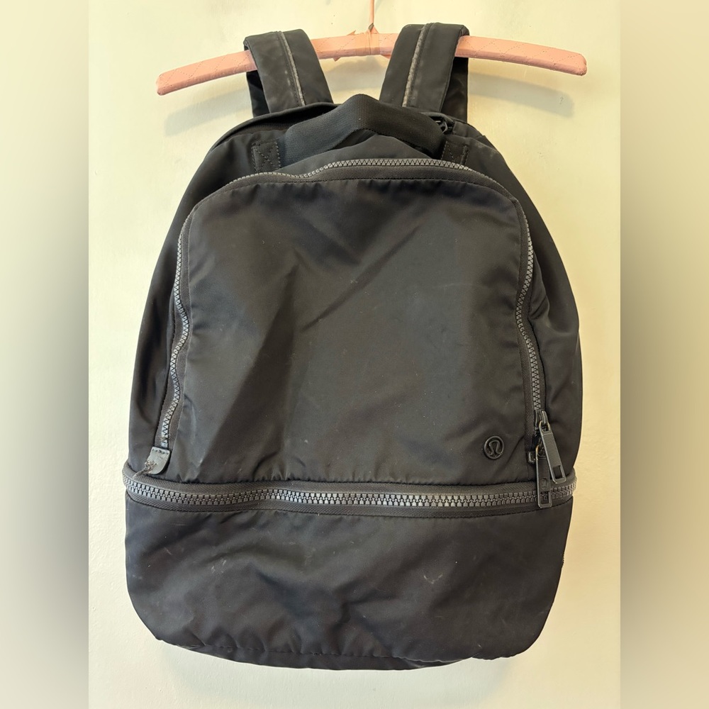 Lululemon black on black backpack one size top handle zip close shoulder straps